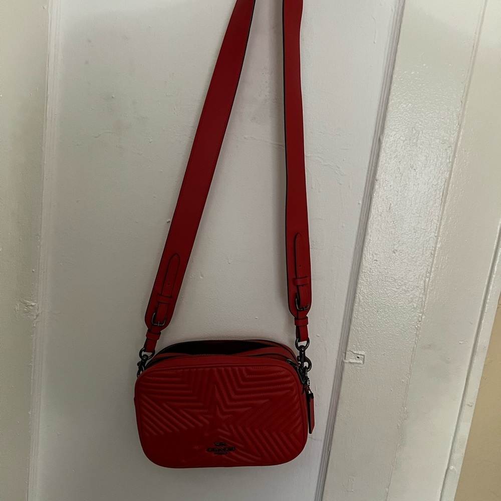Like new - Miami Red Coach Marvel edition Gunmetal hardware